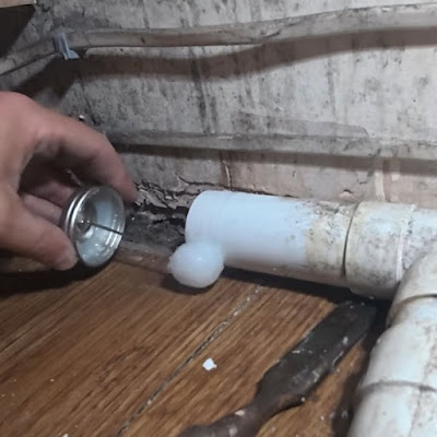 Drain pipe repair under floor by Reliable Plumbers Dallastown